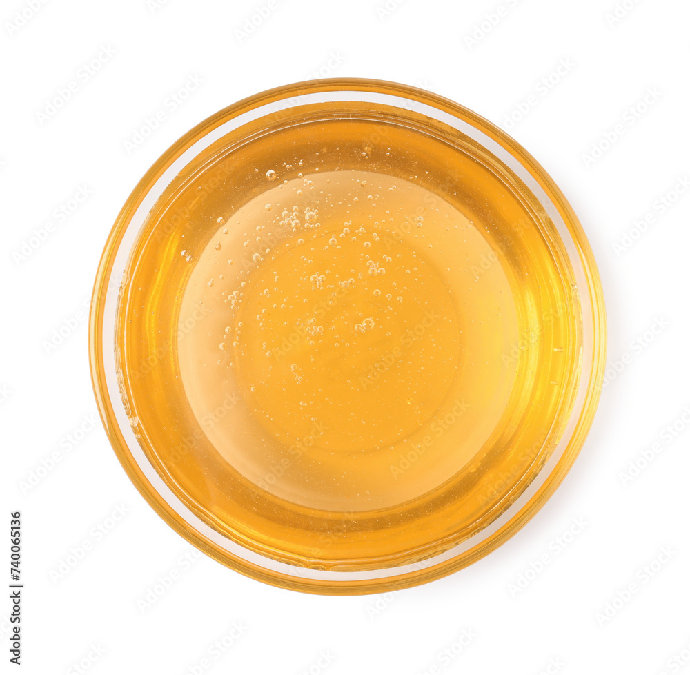 Tasty honey in bowl isolated on white, top view Tasty honey in bowl isolated on white, top view