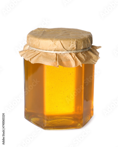 Tasty natural honey in glass jar isolated on white