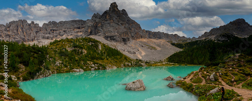 Turquoise Sorapis Lake in Cortina d'Ampezzo, with Dolomite Mountains and Forest - Sorapis Circuit, Dolomites, Italy, Europe photo