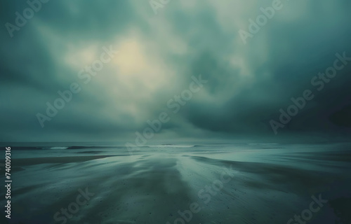 a photo of an empty beach with light and dark clouds 