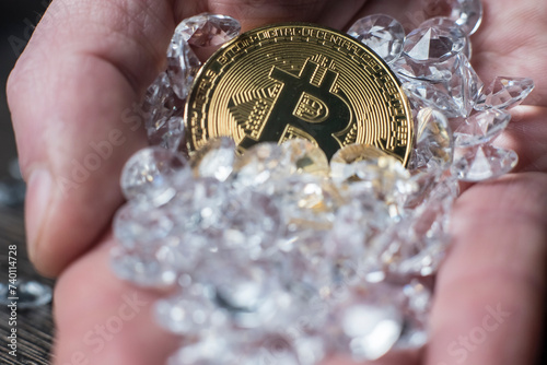 moneta bitcoin na tle kamieni szlachetnych photo