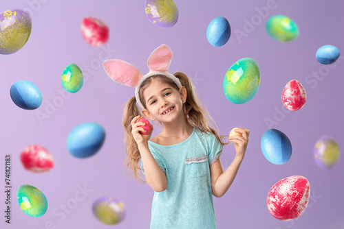 Little girl with Easter egg...