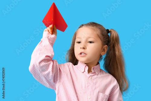 Cute little girl with paper...