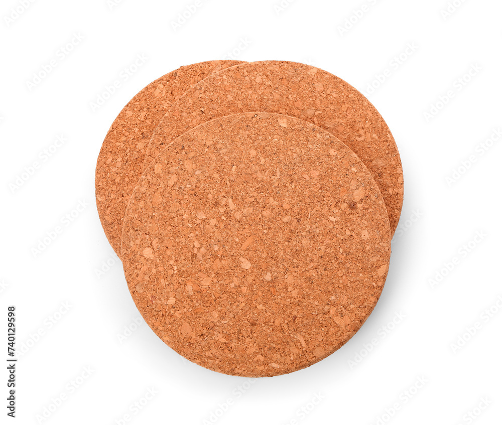Round cork table coasters on white background Round cork table coasters on white background