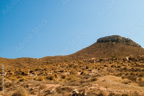 Mesa de Roldán hill from Enmedio cove in Níjar, Almería, Spain. Hill located on the coast of the Mediterranean Sea, next to the district of Agua Amarga.