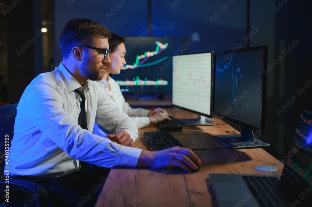 Business team investment working with computer, planning and analyzing graph stock market trading with stock chart data