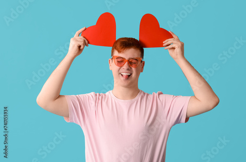 Funny young man with red pa...