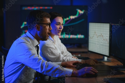 Business team investment working with computer, planning and analyzing graph stock market trading with stock chart data