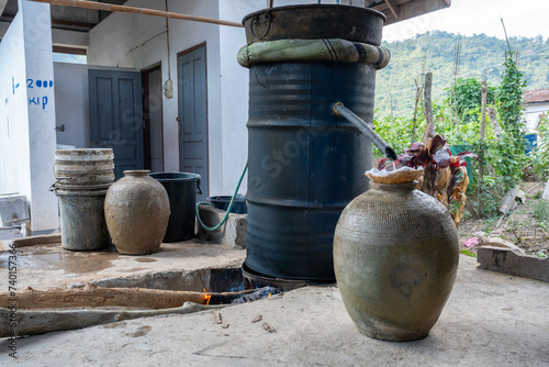 Distillation of Laos Whisky in a village near Luang Prabang, Laos, South-East Asia