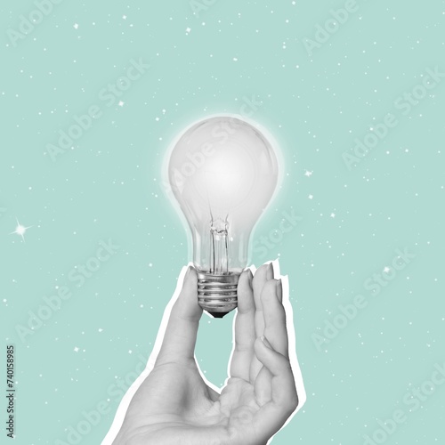 Ð¡ontemporary collage of human hand with a light bulb. © BillionPhotos.com