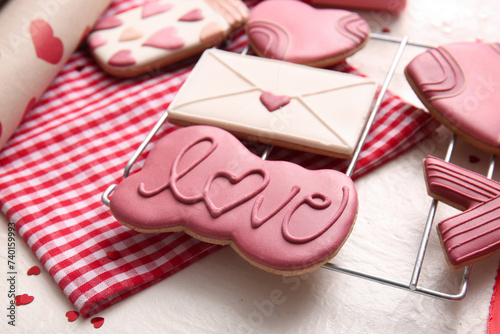 Sweet cookies with decor on white grunge background. Valentine's Day celebration