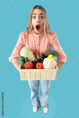 Surprised young woman with ...