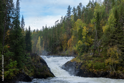 View to a powerful Jyr  v   waterfall on a autumn day in Oulanka National Park  Northern Finland 