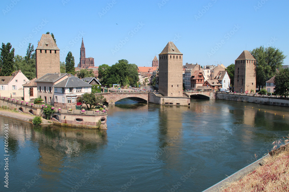 ill river, medieval towers and bridges (ponts couverts) in strasbourg in alsace in france 