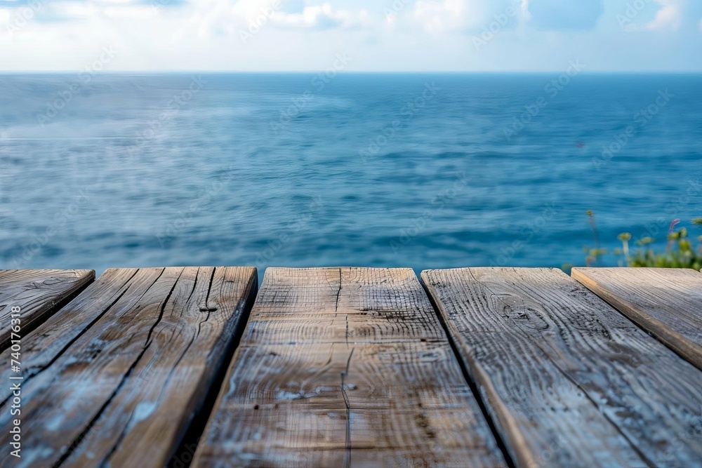 Wooden table foreground with a panoramic view of the ocean Offering a natural and serene backdrop for product presentations or tranquil scenes.