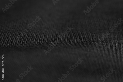 Black rough canvas texture. Abstract woven fiber