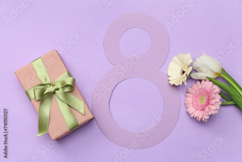 Figure 8 made of paper with different beautiful flowers and gift box on purple background. International Women's Day