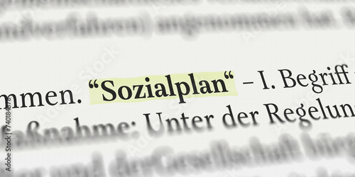 Das Wort Sozialplan im Buch mit Textmarker markiert