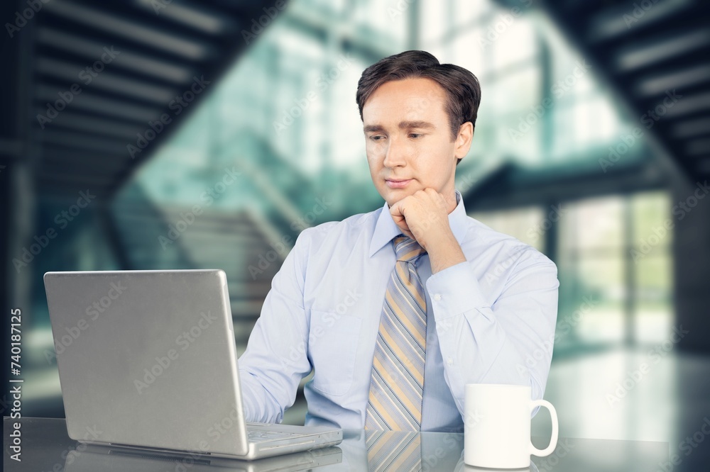 Young successful programmer working ins development company Young successful programmer working ins development company
