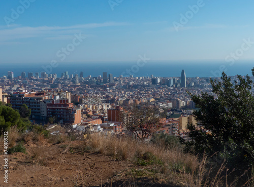 Urban landscape, panorama of the city take from the mountain photo