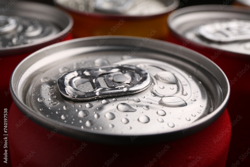 Energy drinks in wet cans, closeup. Functional beverage Energy drinks in wet cans, closeup. Functional beverage
