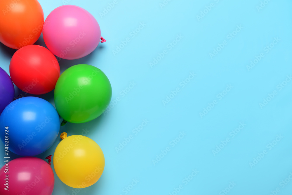Colorful festive balloons on blue background Colorful festive balloons on blue background