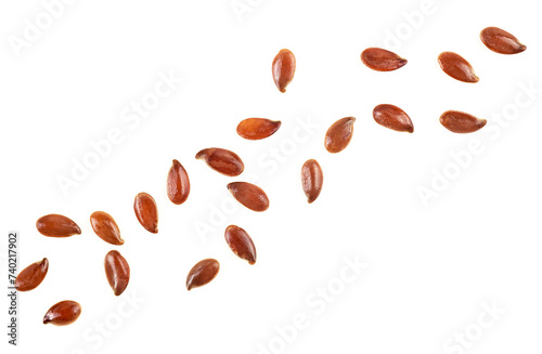 Linseeds isolated on a white background, view from above. Brown flax seeds.
