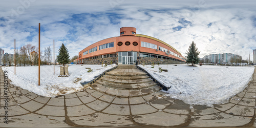 winter hdri 360 panorama view near an old soviet brutalist building and urban development in equirectangular seamless spherical projection, AR VR content photo
