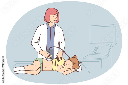 Female doctor do ultrasound of girl in clinic