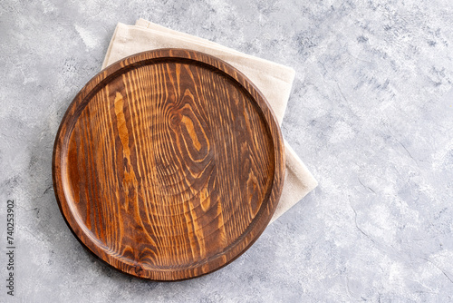 Cutting board over marble table background. Cooking backdrop. Top view with space for your recipe