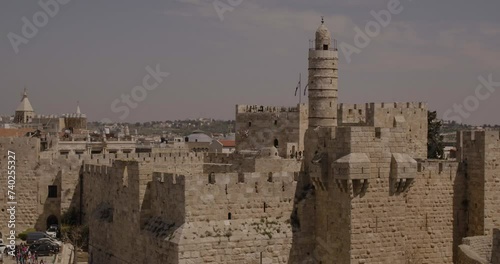 Aerial Footage of the Tower of David, the walls of the Old City and the Old City of Jerusalem.