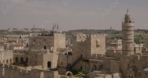 Aerial Footage of the Tower of David, the walls of the Old City and the Old City of Jerusalem.