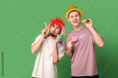 Two young men celebrating w...