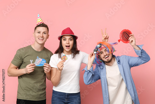 Three young friends celebra...