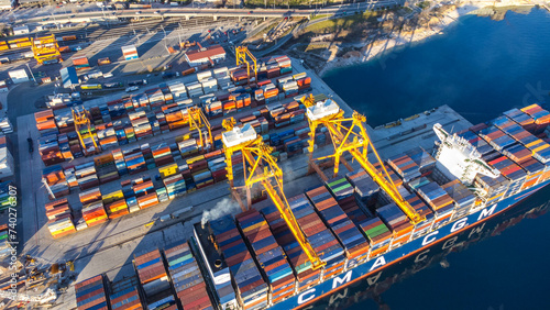 Breathtaking aerial view of Rijeka, Croatia, as a ship is being unloaded in the bustling port 