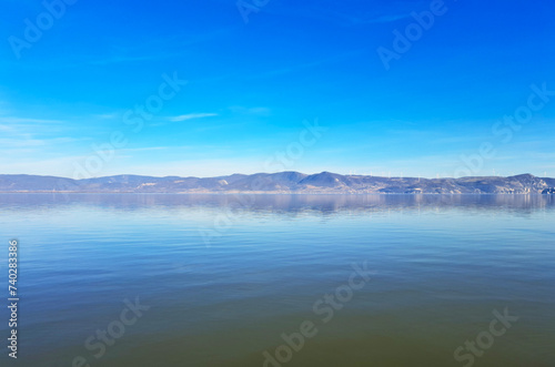 Horizontal photo of a lake formed on Danube river near Golubac town and fortress