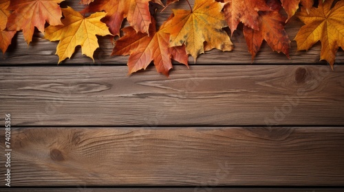 Rustic Autumn Vibes: Colorful Maple Leaves Scattered on Wooden Background