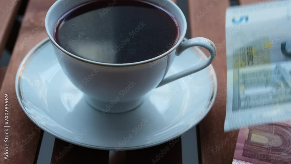 herbal tea in red color in dramatic light and gray background white cup
herbal tea in red color in dramatic light and gray background white cup