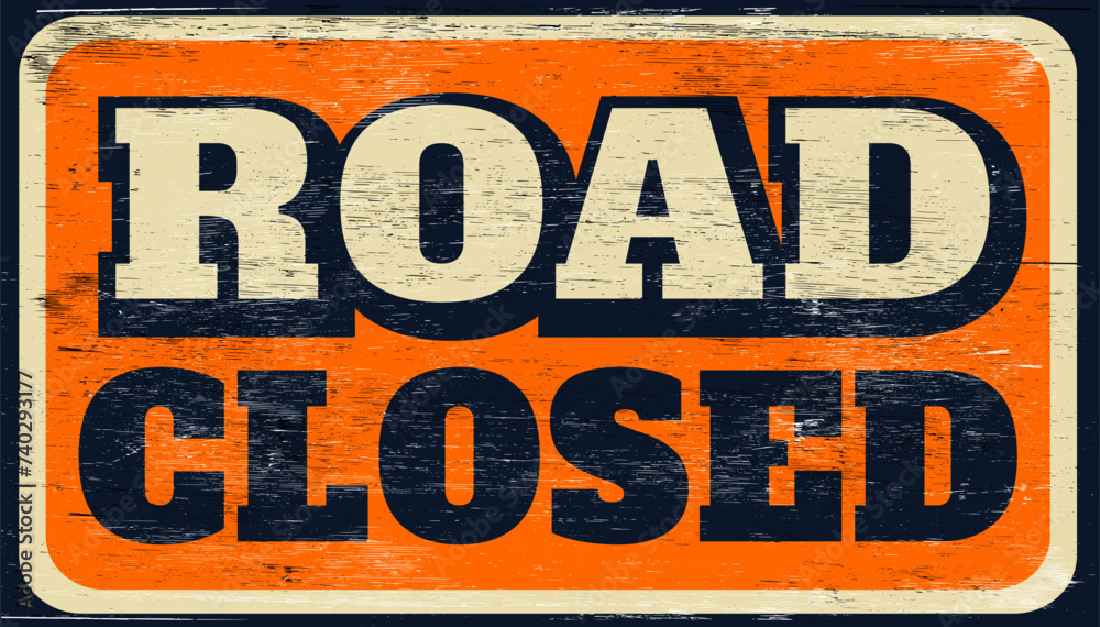Fototapeta premium Distressed road closed sign on wood
