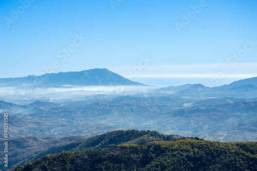 Panoramic view on pine forest on hiking trail to peak Torrecilla, Sierra de las Nieves national park, Andalusia, Spain