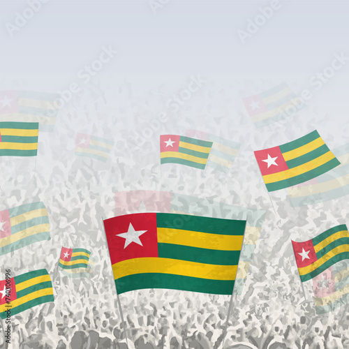 Crowd of people waving flag of Togo square graphic for social media and news.