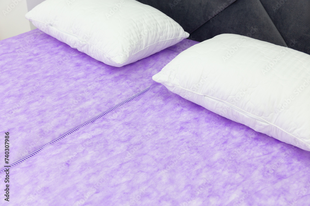 Fototapeta premium Two snow-white pillows on the bed