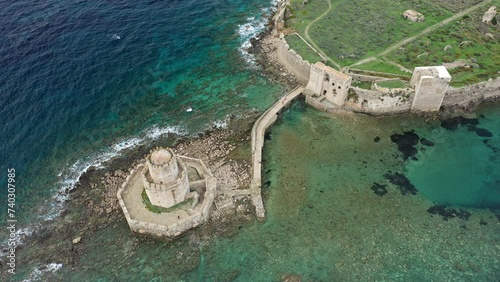 The Chateau de Methoni a Modon seen from the sky in Europe, Greece, the Peloponnese, Mani, in summer, on a sunny day. photo