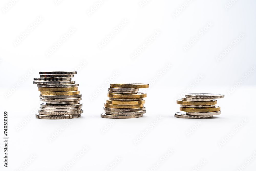 Polish currency. Polish zloty coins stacked on each other in different positions. Money concept on white background Polish currency. Polish zloty coins stacked on each other in different positions. Money concept on white background