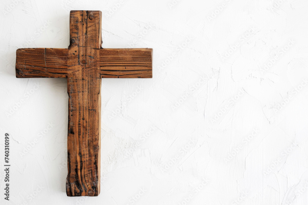 Brown Wooden Cross on White Textured Background
