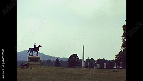 Gettysburg, Pennsylvania, United States - in 1980: The historical Gettysburg national military park cemetery of USA in 80s archival. Statue of General George Meade and State of Pennsylvania Monument. photo