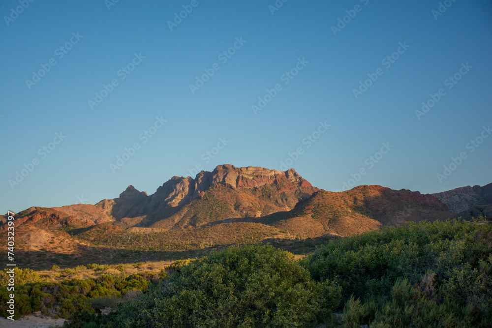 Beautiful mountain scenery in the desert of Baja California Sur at sunset, Mexico. Beautiful mountain scenery in the desert of Baja California Sur at sunset, Mexico.