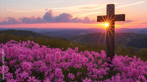 Serene sunset behind wooden cross amidst wildflowers overlooking hills