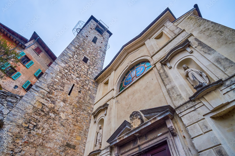 The stone bell tower of Chiesa di San Vigilio church in Gandria, Switzerland