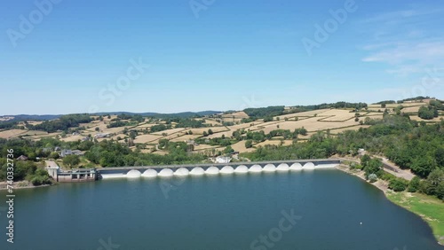 The Panneciere Chaumard dam in the middle of the countryside in Europe, France, Burgundy, Nievre, Morvan, in summer, on a stormy day. photo